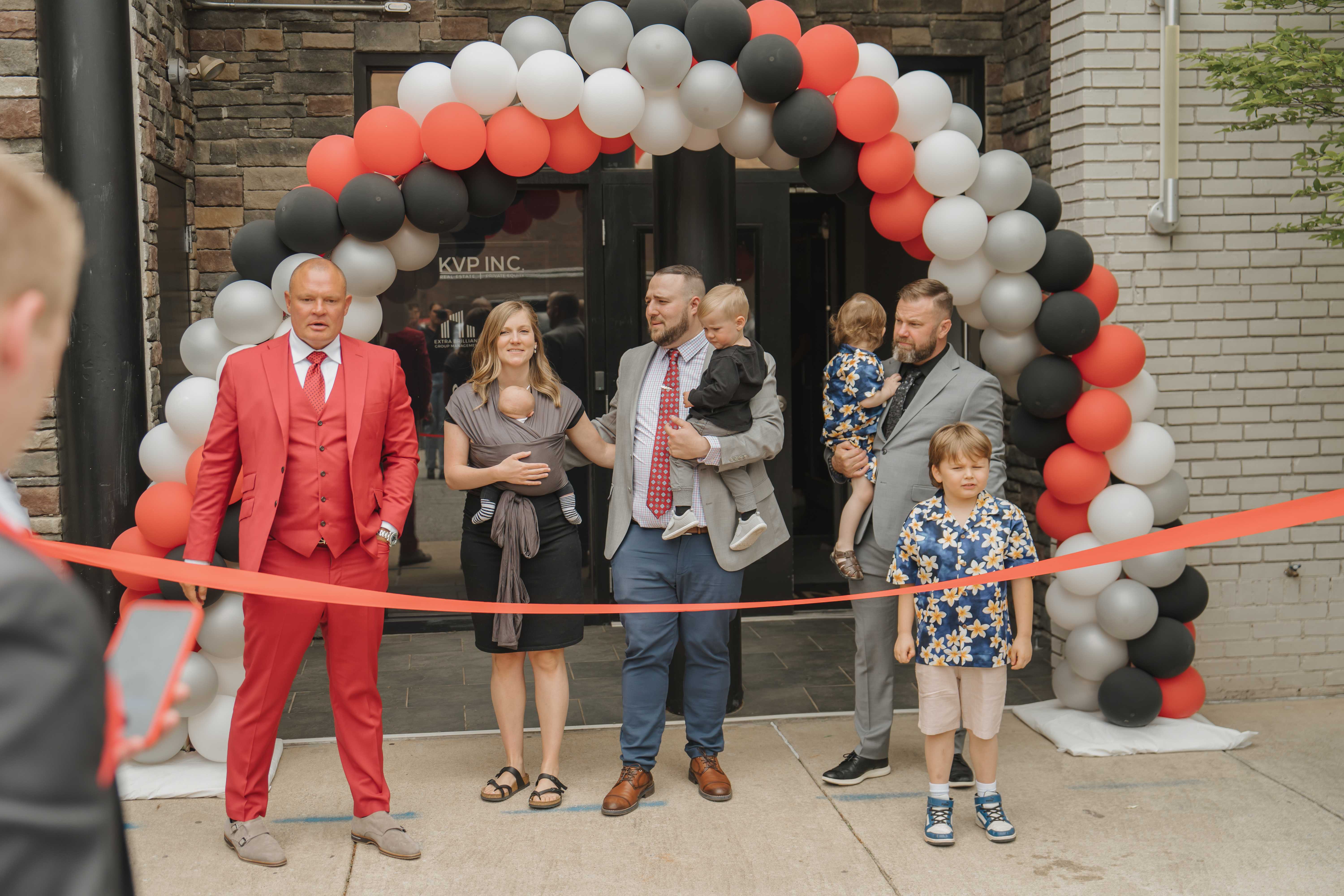 The Living Hope team celebrating together at a ribbon cutting